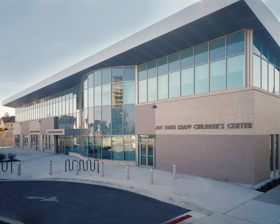 Conversion of an existing single-story retail structure into a 2-story school and recreational center.